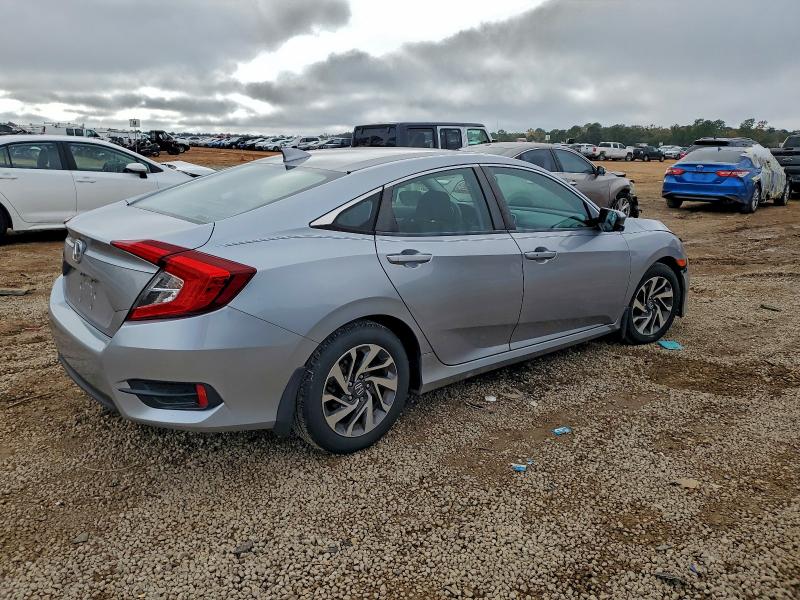 Photo 3 from auction – 2018 HONDA CIVIC EX with VIN 2HGFC2F79JH604369