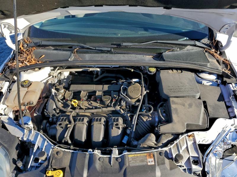 Photo 11 from auction – 2014 FORD FOCUS SE with VIN 1FADP3F29EL159358