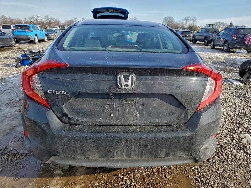 Photo 6 from auction – 2016 HONDA CIVIC LX with VIN 2HGFC2F59GH538901