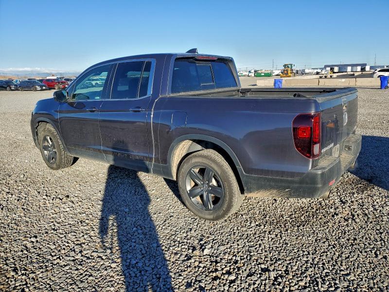 Photo 2 from auction – 2023 HONDA RIDGELINE with VIN 5FPYK3F55PB053488