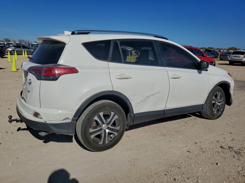 Photo 3 from auction – 2017 TOYOTA RAV4 LE with VIN JTMZFREV9HJ138740