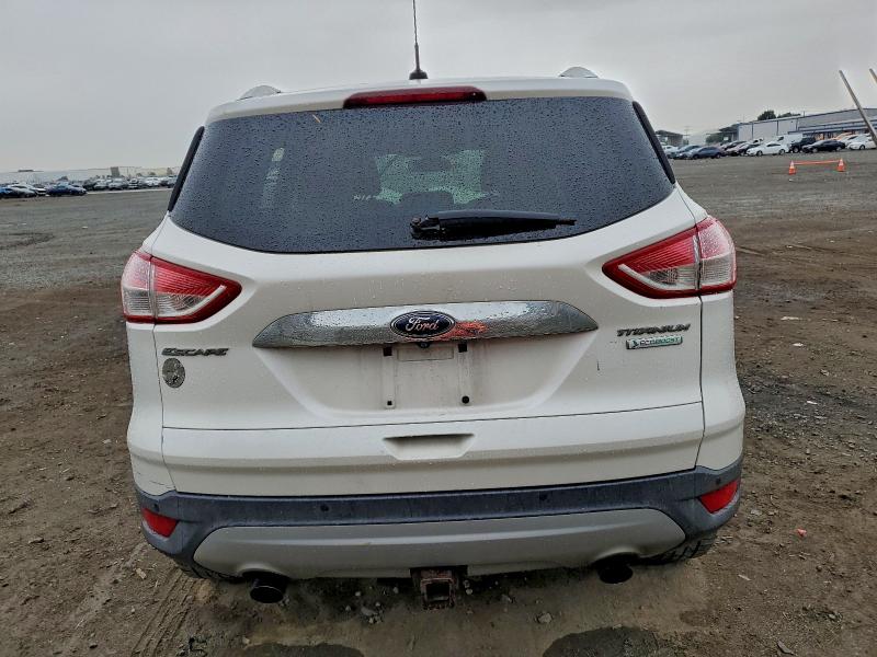 Photo 6 from auction – 2015 FORD ESCAPE TIT with VIN 1FMCU0J98FUA79252