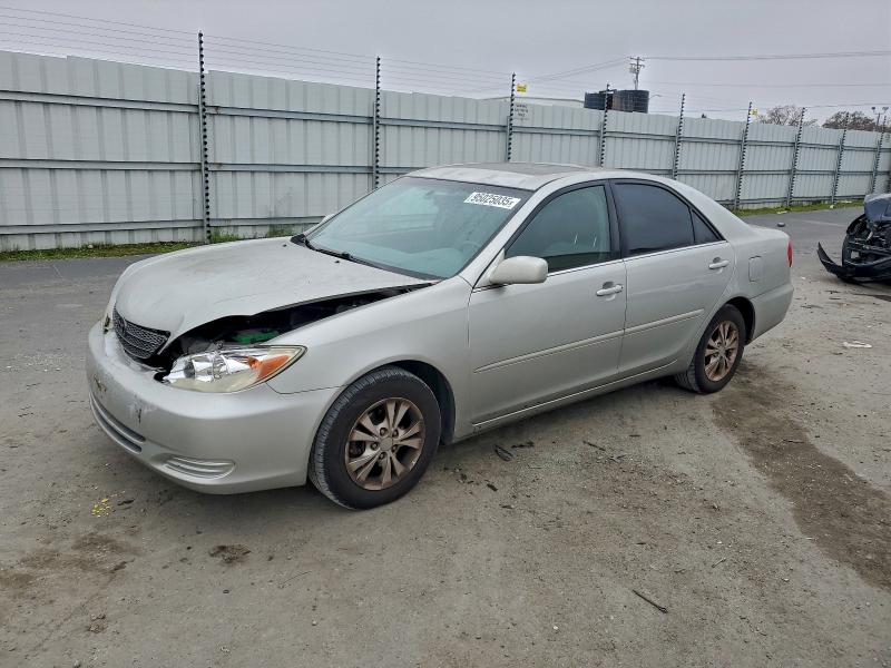 TOYOTA CAMRY LE 2004 with VIN 4T1BF30K54U064281 - Photo from auction