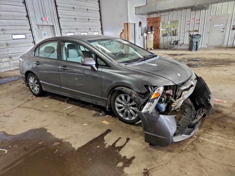 Photo 4 from auction – 2010 HONDA CIVIC EX with VIN 19XFA1F8XAE024938