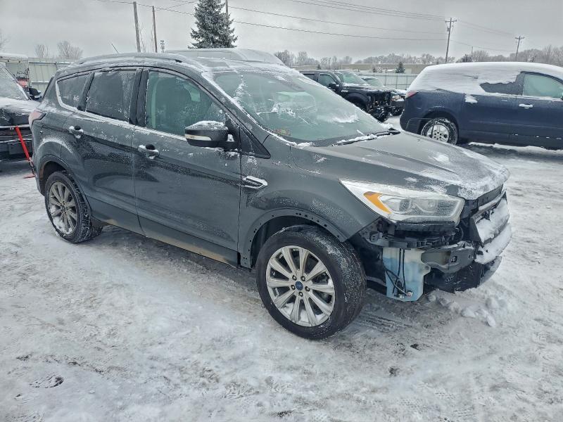 Photo 4 from auction – 2017 FORD ESCAPE TIT with VIN 1FMCU9J99HUE22237