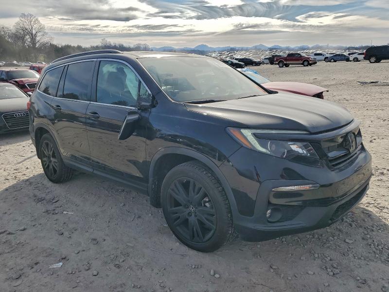 Photo 4 from auction – 2022 HONDA PILOT with VIN 5FNYF6H22NB037618