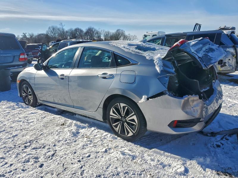 Photo 2 from auction – 2018 HONDA CIVIC EXL with VIN 19XFC1F79JE201741