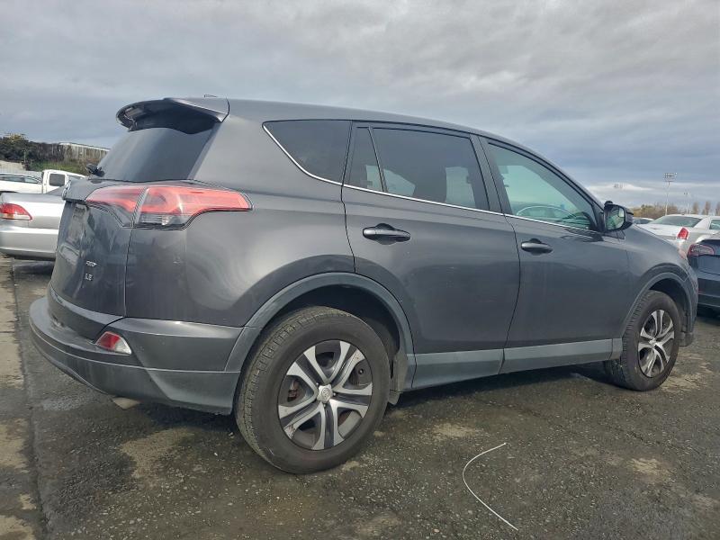Photo 3 from auction – 2018 TOYOTA RAV4 LE with VIN 2T3BFREV4JW774555