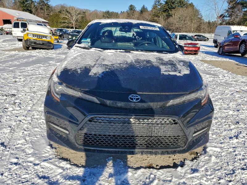Photo 5 from auction – 2021 TOYOTA COROLLA SE with VIN 5YFS4MCE2MP064399