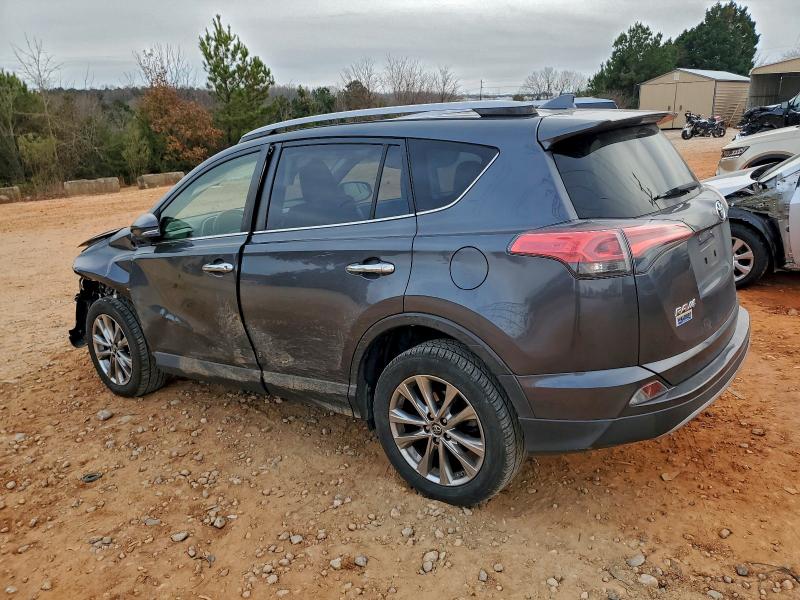 Photo 2 from auction – 2018 TOYOTA RAV4 LIMIT with VIN JTMDFREV7JD231979