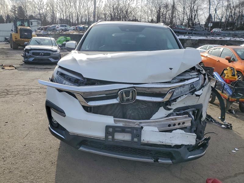Photo 5 from auction – 2021 HONDA PILOT TOUR with VIN 5FNYF6H61MB031844