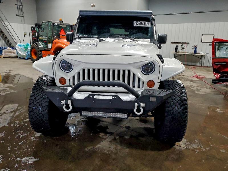 Photo 5 from auction – 2010 JEEP WRANGLER U with VIN 1J4BA3H15AL102375