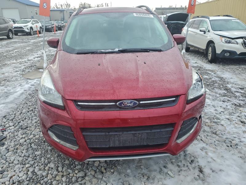 Photo 5 from auction – 2016 FORD ESCAPE SE with VIN 1FMCU9GX9GUB21178