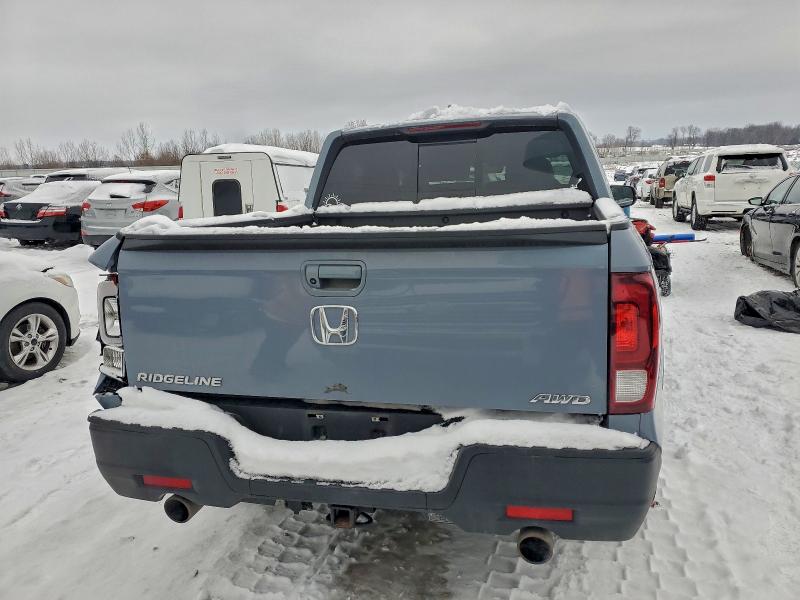 Photo 6 from auction – 2023 HONDA RIDGELINE with VIN 5FPYK3F51PB030189