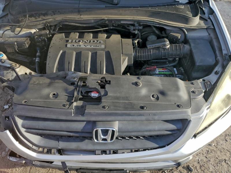 Photo 12 from auction – 2005 HONDA PILOT EXL with VIN 5FNYF185X5B009708