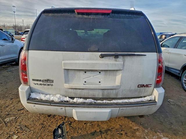 Photo 6 from auction – 2009 GMC YUKON with VIN 1GKFK13299J104103