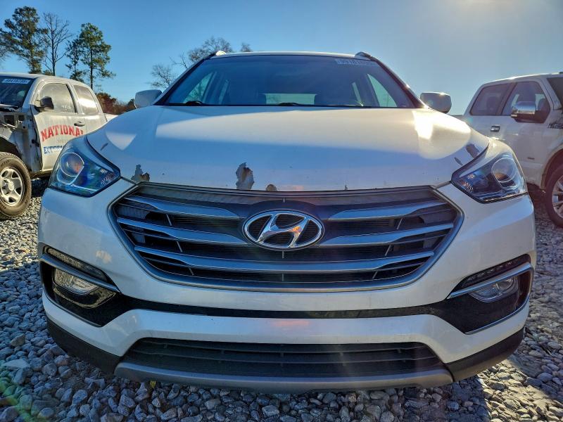 Photo 5 from auction – 2017 HYUNDAI SANTA FE S with VIN 5NMZU3LB8HH005923