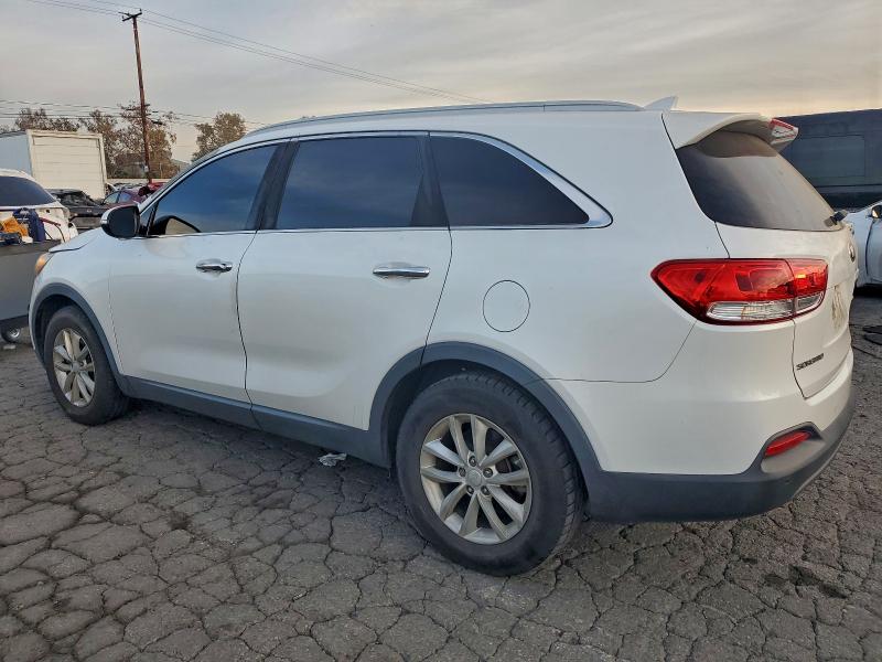 Photo 2 from auction – 2016 KIA SORENTO LX with VIN 5XYPG4A56GG072322