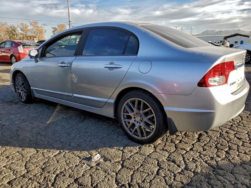 Photo 2 from auction – 2009 HONDA CIVIC EX with VIN 19XFA16899E021511
