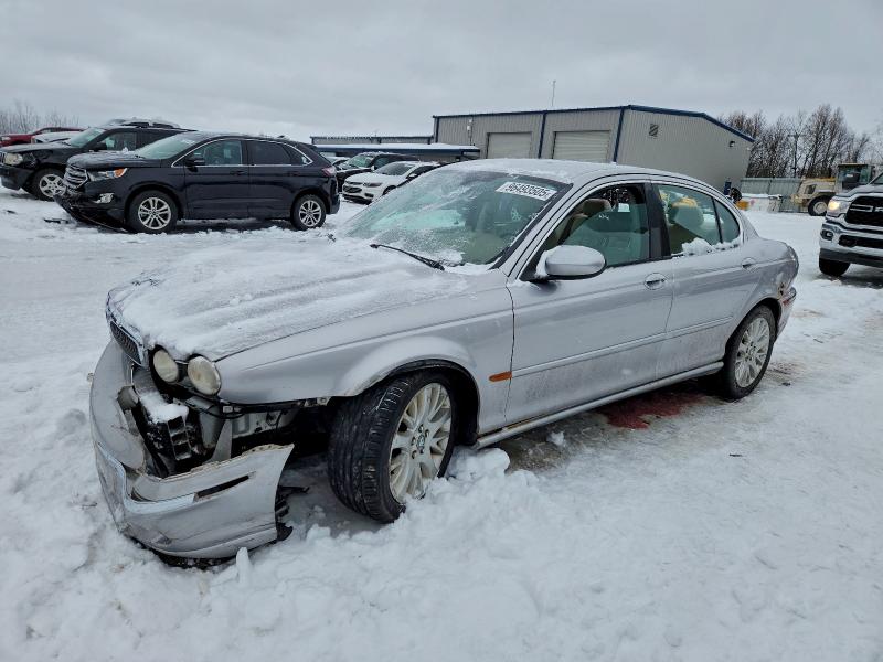 JAGUAR X-TYPE 2.5 2003 with VIN SAJEA51DX3XC90880 - Photo from auction