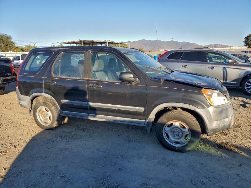Photo 4 from auction – 2004 HONDA CR-V with VIN JHLRD68404C023999
