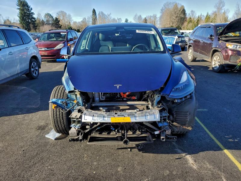 Photo 5 from auction – 2023 TESLA MODEL Y with VIN 7SAYGDEEXPF609556