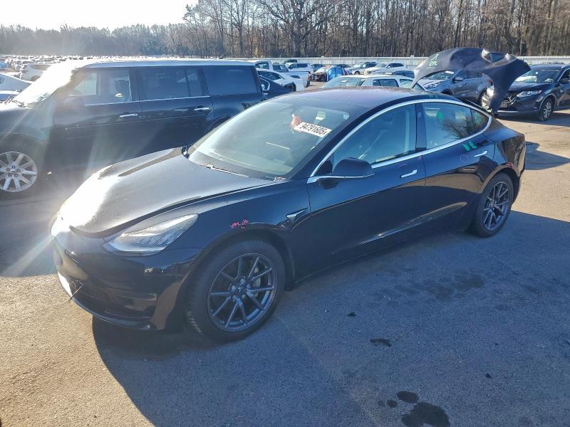 TESLA MODEL 3 2018 with VIN 5YJ3E1EB0JF070714 - Photo from auction