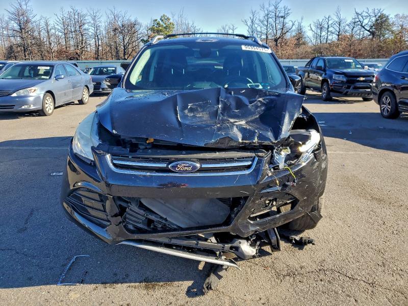Photo 5 from auction – 2014 FORD ESCAPE TIT with VIN 1FMCU9J93EUB91122