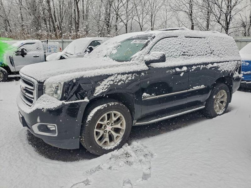 GMC YUKON SLT 2016 with VIN 1GKS2BKC0GR250936 - Photo from auction