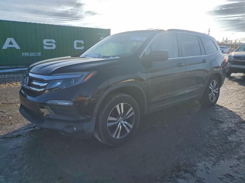 HONDA PILOT EXL 2016 with VIN 5FNYF6H55GB101082 - Photo from auction