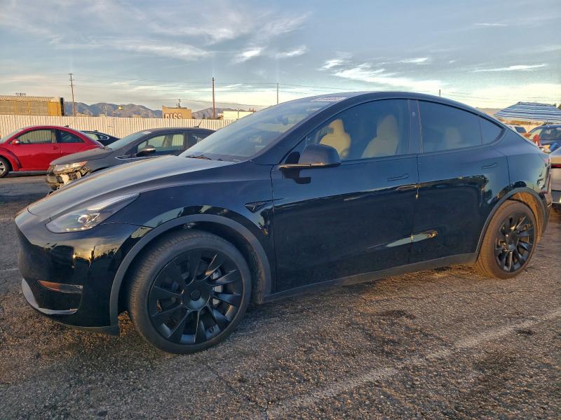 TESLA MODEL Y 2023 with VIN 7SAYGDEE6PA210012 - Photo from auction
