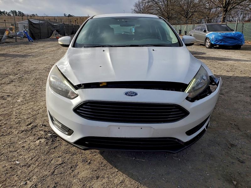 Photo 5 from auction – 2016 FORD FOCUS SE with VIN 1FADP3KE7GL211086