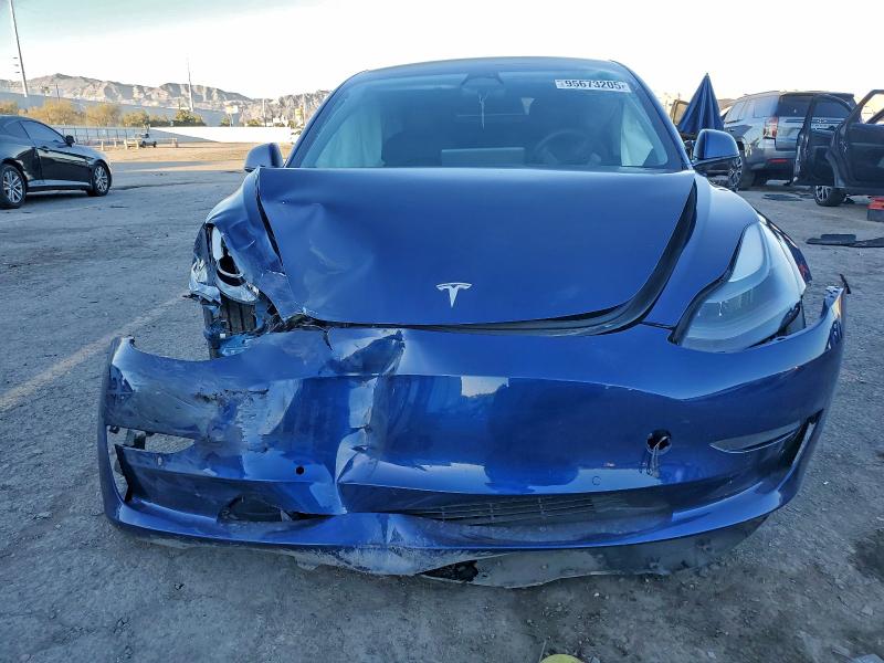 Photo 5 from auction – 2022 TESLA MODEL 3 with VIN 5YJ3E1EB2NF135665