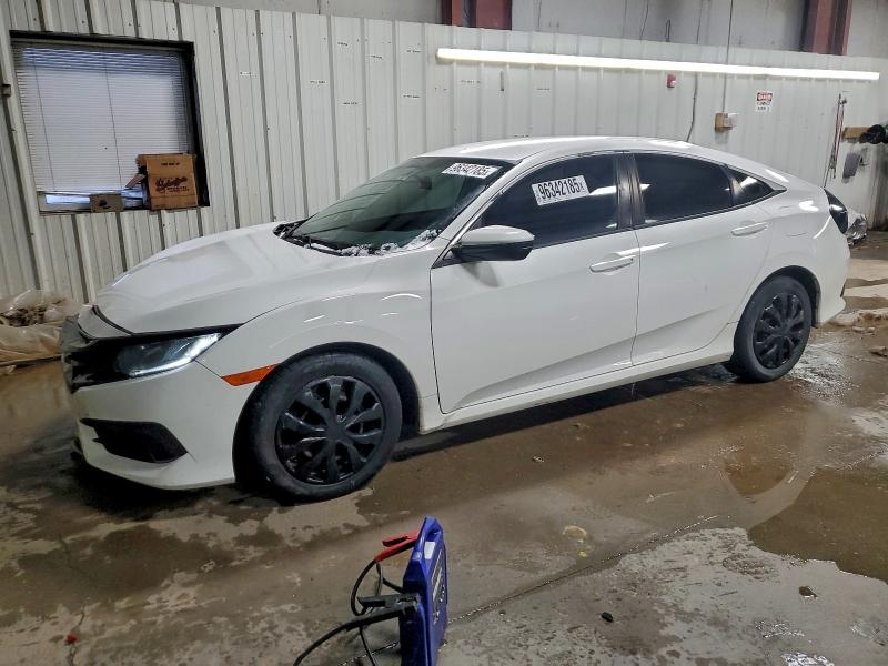 HONDA CIVIC LX 2018 with VIN 19XFC2F5XJE023875 - Photo from auction