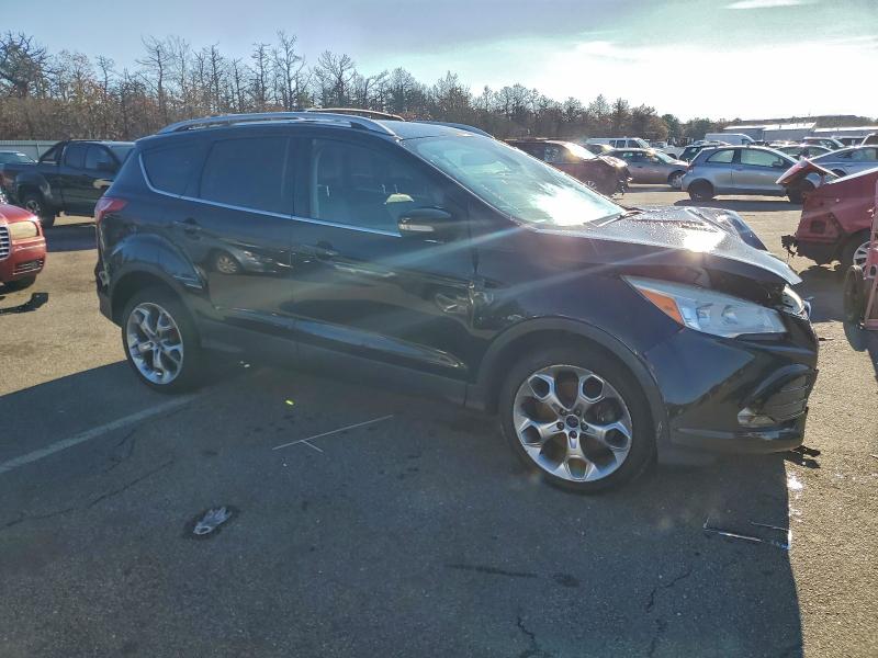 Photo 4 from auction – 2014 FORD ESCAPE TIT with VIN 1FMCU9J93EUB91122