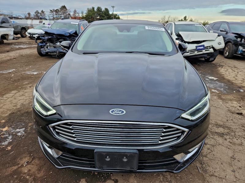 Photo 5 from auction – 2017 FORD FUSION TIT with VIN 3FA6P0D94HR331633