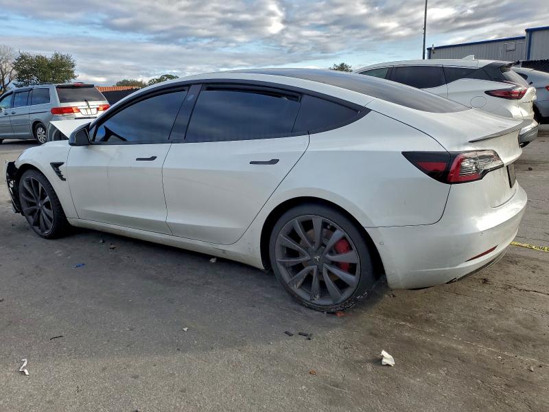 Photo 2 from auction – 2020 TESLA MODEL 3 with VIN 5YJ3E1EC5LF642033