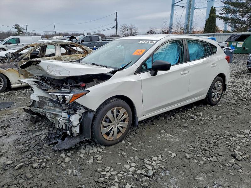 SUBARU IMPREZA 2019 with VIN 4S3GTAA66K3704087 - Photo from auction