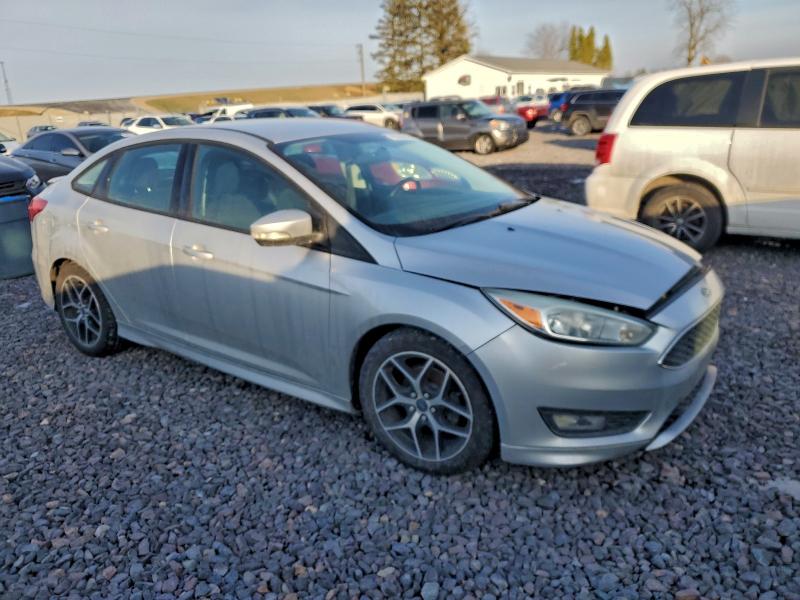 Photo 4 from auction – 2015 FORD FOCUS with VIN 1FADP3F21FL279849