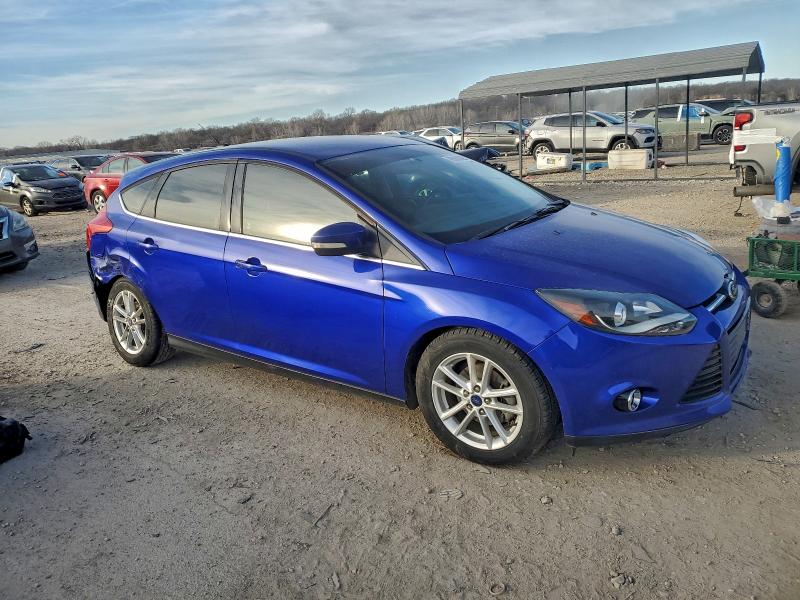 Photo 4 from auction – 2013 FORD FOCUS TITA with VIN 1FADP3N25DL371237