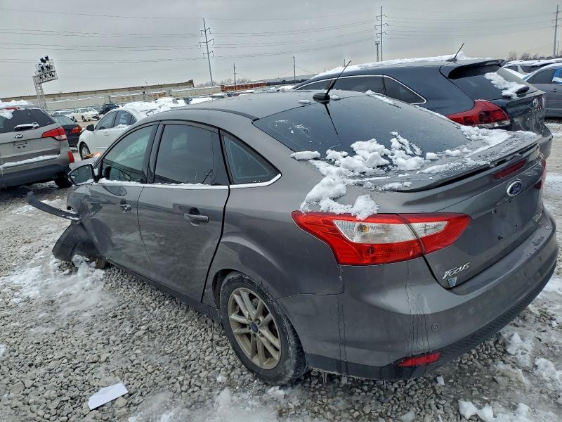 Photo 2 from auction – 2014 FORD FOCUS with VIN 1FADP3J27EL329935