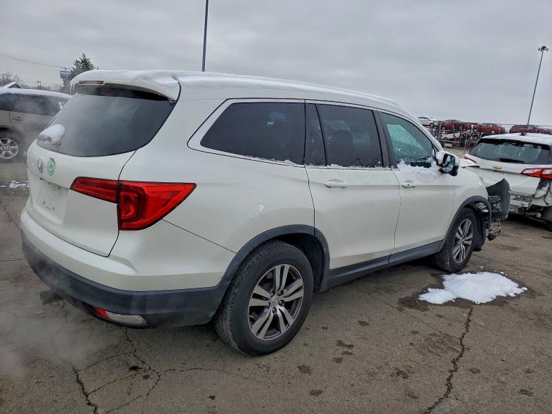 Photo 3 from auction – 2016 HONDA PILOT EXL with VIN 5FNYF5H55GB013255