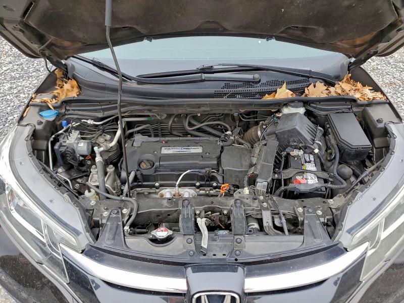 Photo 12 from auction – 2015 HONDA CR-V LX with VIN 5J6RM4H30FL130332