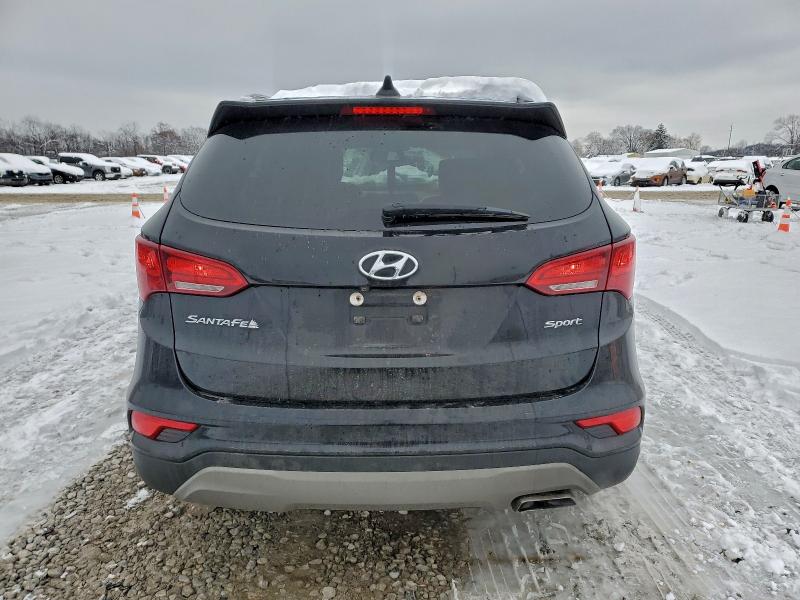 Photo 6 from auction – 2017 HYUNDAI SANTA FE S with VIN 5NMZU3LB9HH021399