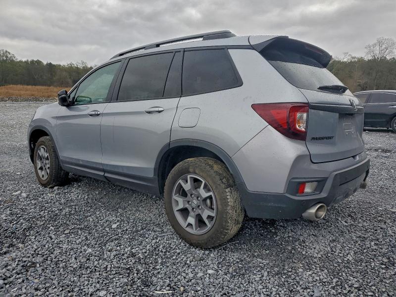 Photo 2 from auction – 2023 HONDA PASSPORT T with VIN 5FNYF8H68PB022588