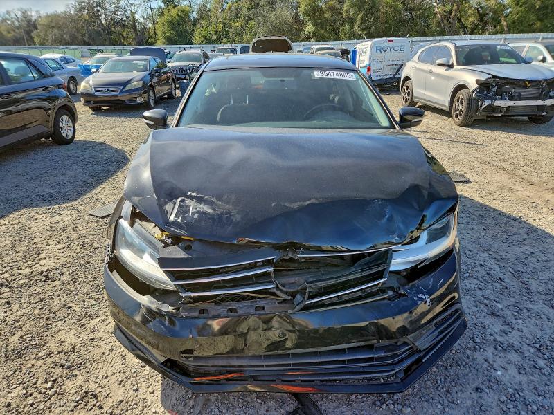 Photo 5 from auction – 2017 VOLKSWAGEN JETTA SE with VIN 3VWDB7AJ3HM279994