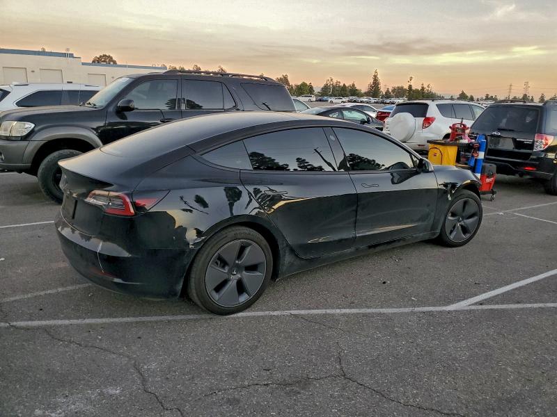 Photo 3 from auction – 2022 TESLA MODEL 3 with VIN 5YJ3E1EAXNF353652
