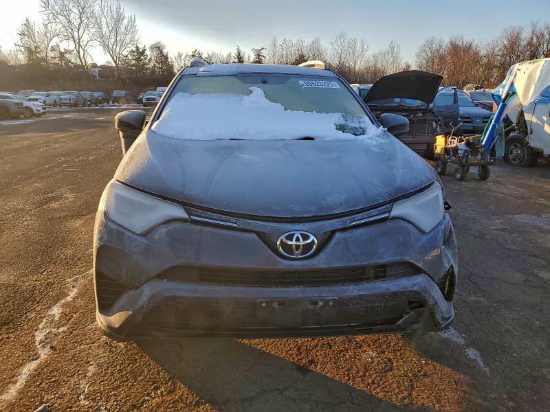 Photo 5 from auction – 2016 TOYOTA RAV4 LE with VIN JTMBFREV1GJ091395