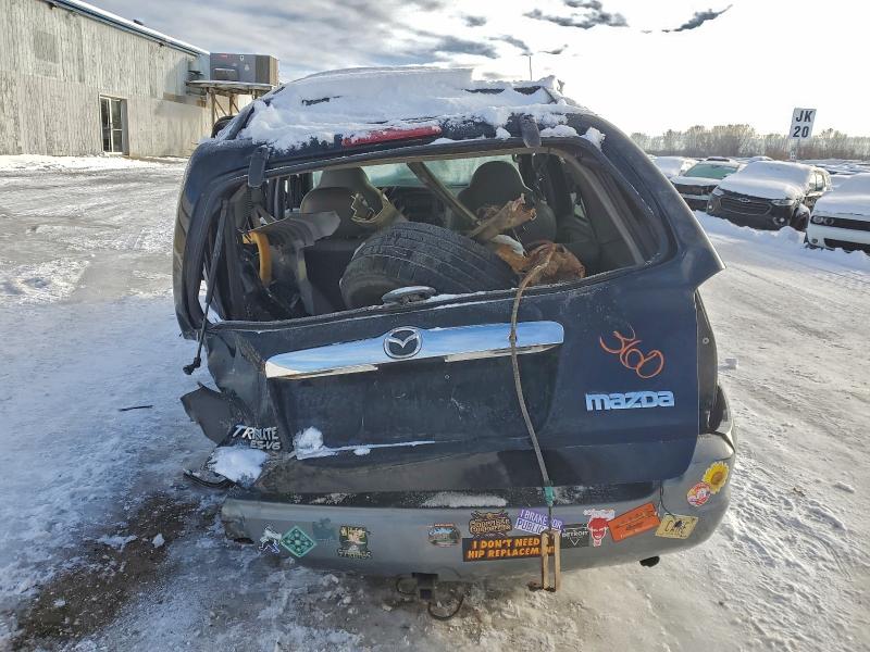 Photo 6 from auction – 2001 MAZDA TRIBUTE LX with VIN 4F2YU08161KM23661