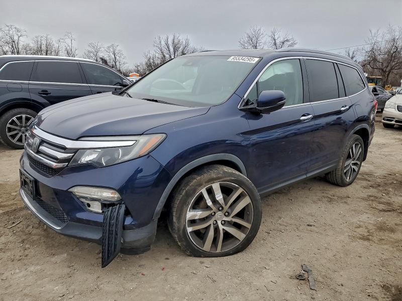 Photo 1 from auction – 2017 HONDA PILOT TOUR with VIN 5FNYF5H96HB045202
